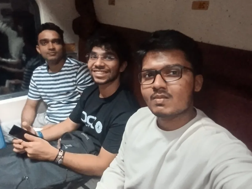 A selfie of Mirza with two hackers sitting in the train on the first night